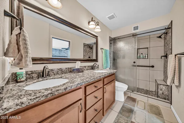 a view of a balcony with table and chairs