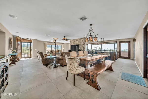 a view of a house with a iron fence