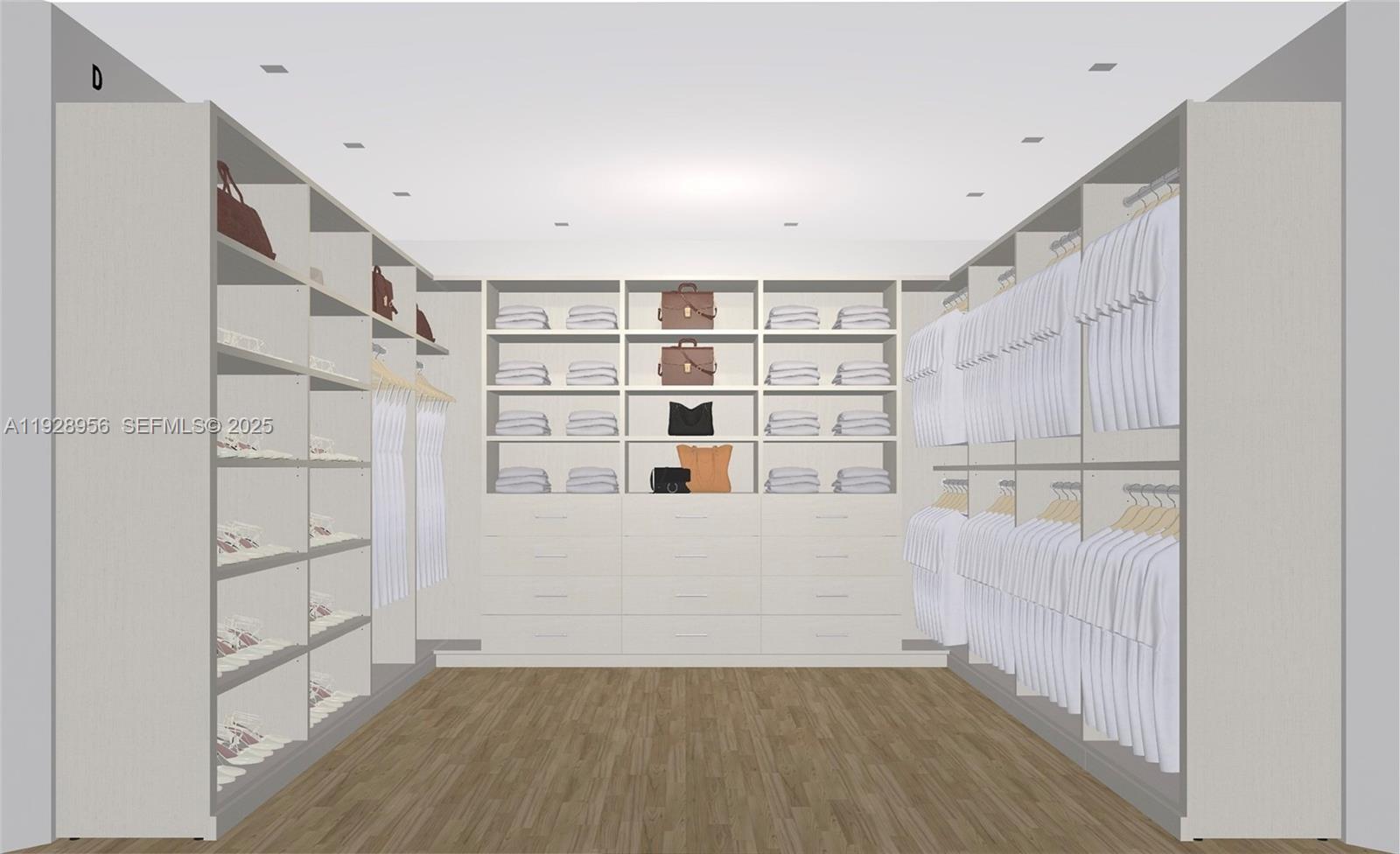 55 Lagorce Circle Miami Beach, FL 33141 - Photo 6 of 13 a view of walk in closet with empty racks