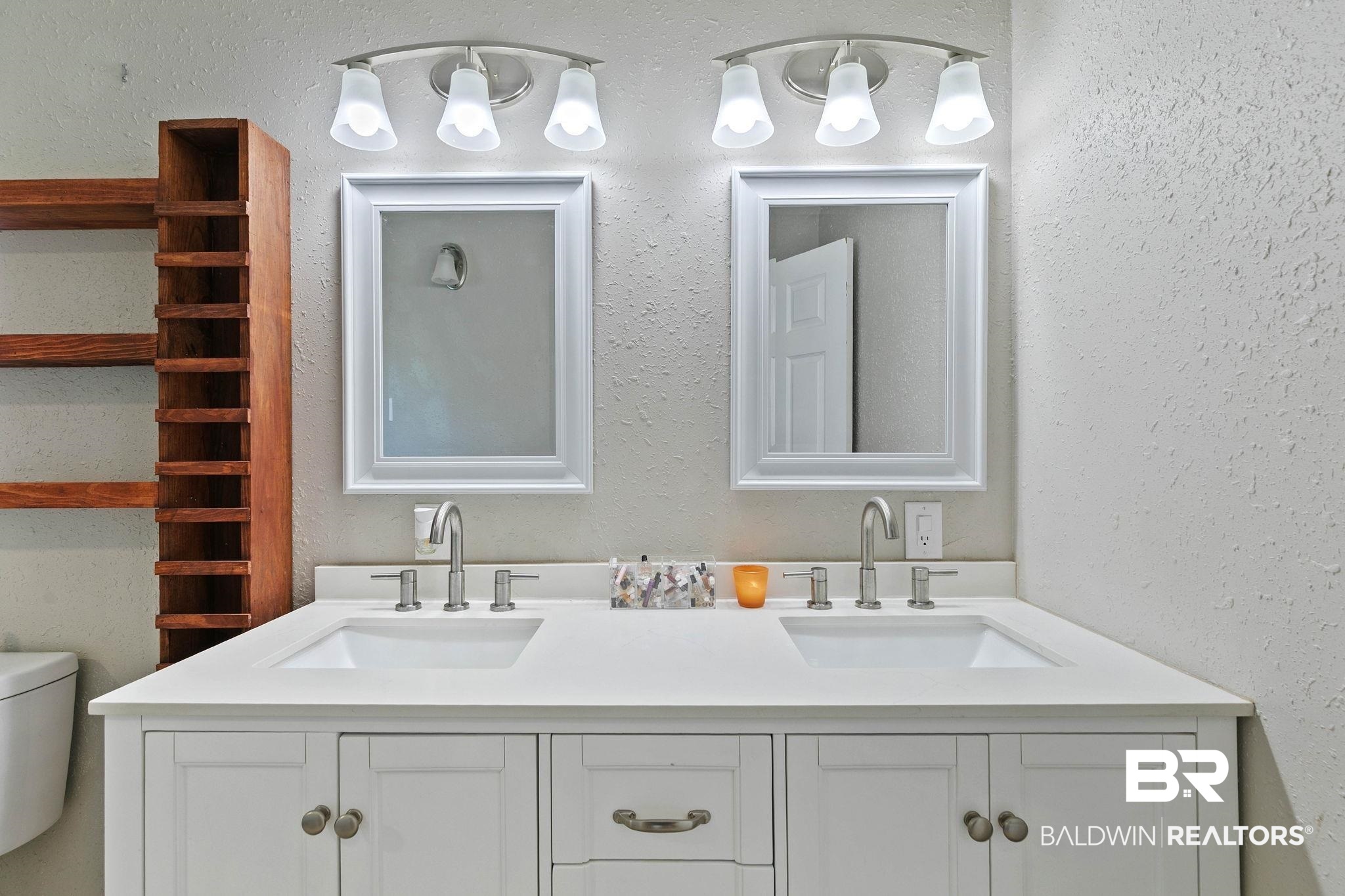 16796 Thompson Road Loxley, AL 36551 - Photo 42 of 93 Full bathroom featuring a textured wall and double vanity