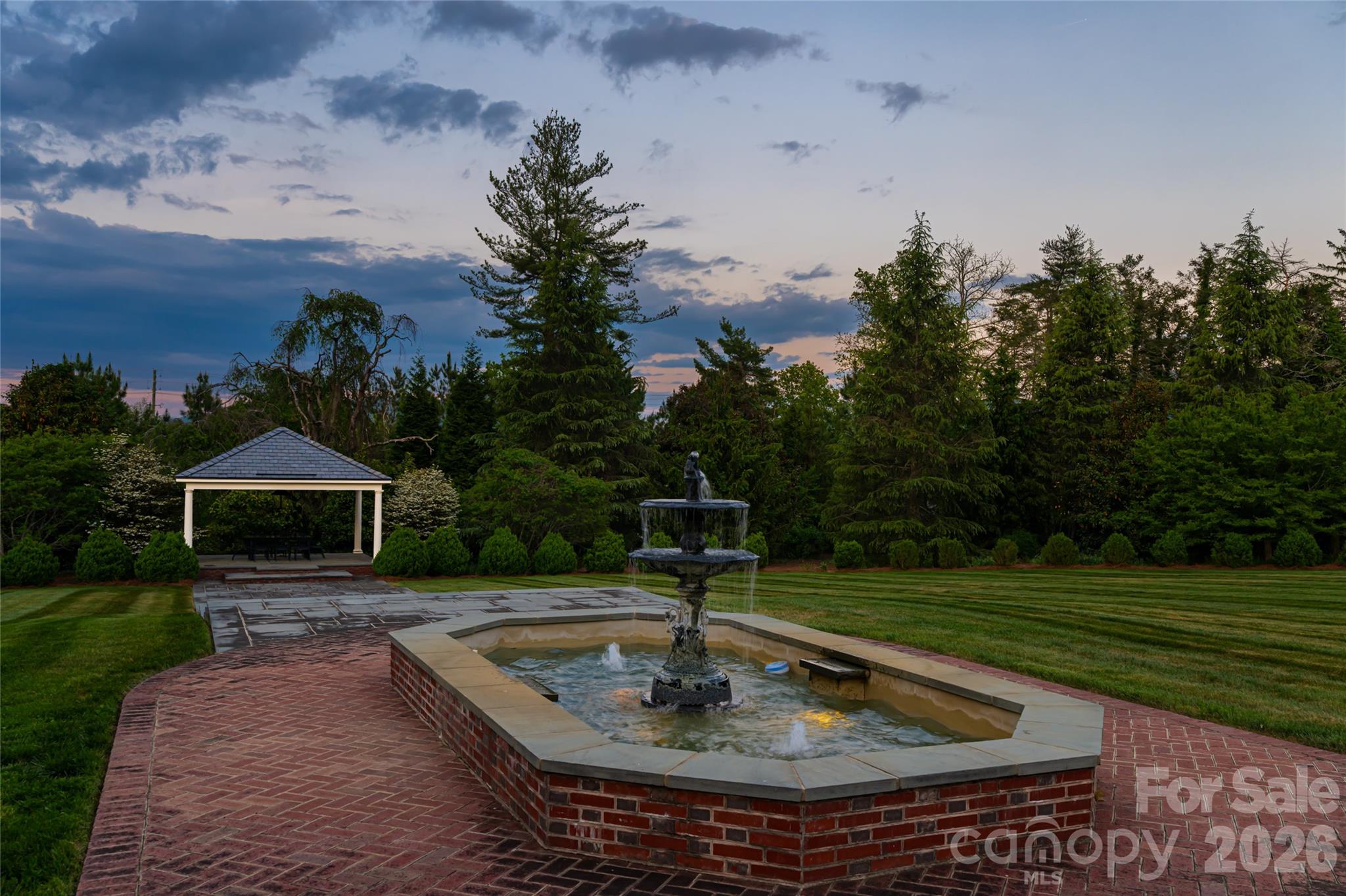 324 Vanderbilt Road Asheville, NC 28803 - Photo 45 of 48 a swimming pool with outdoor seating and trees