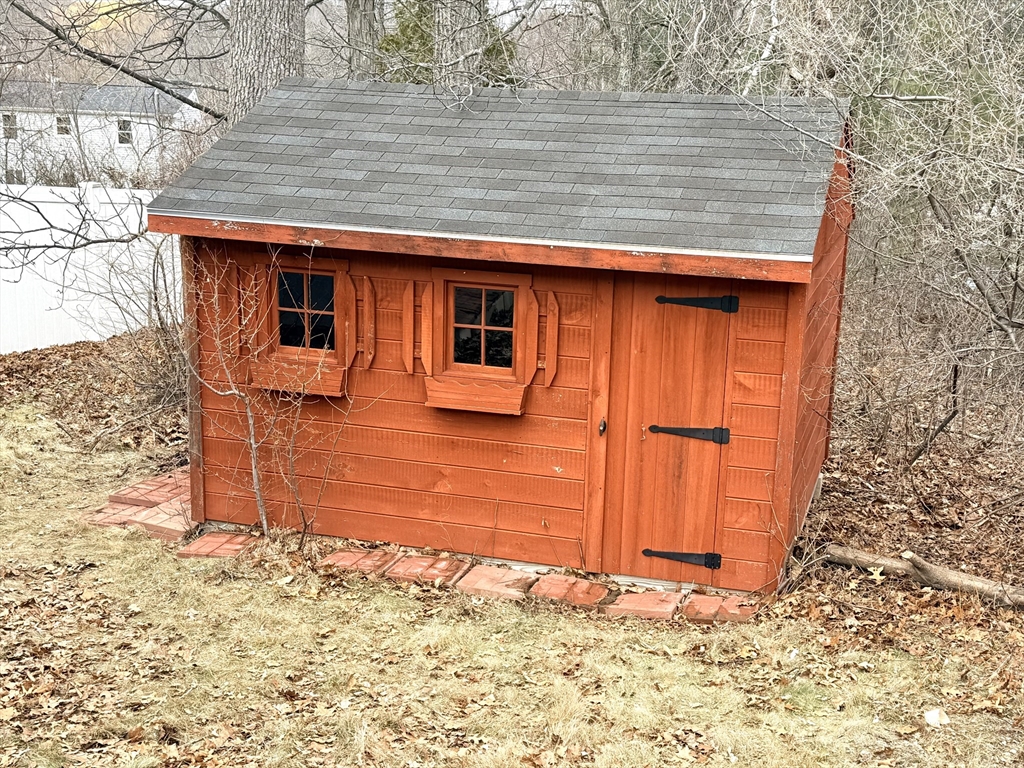 11 Timrod Drive Worcester, MA 01603 - Photo 3 of 4 a backyard of a house