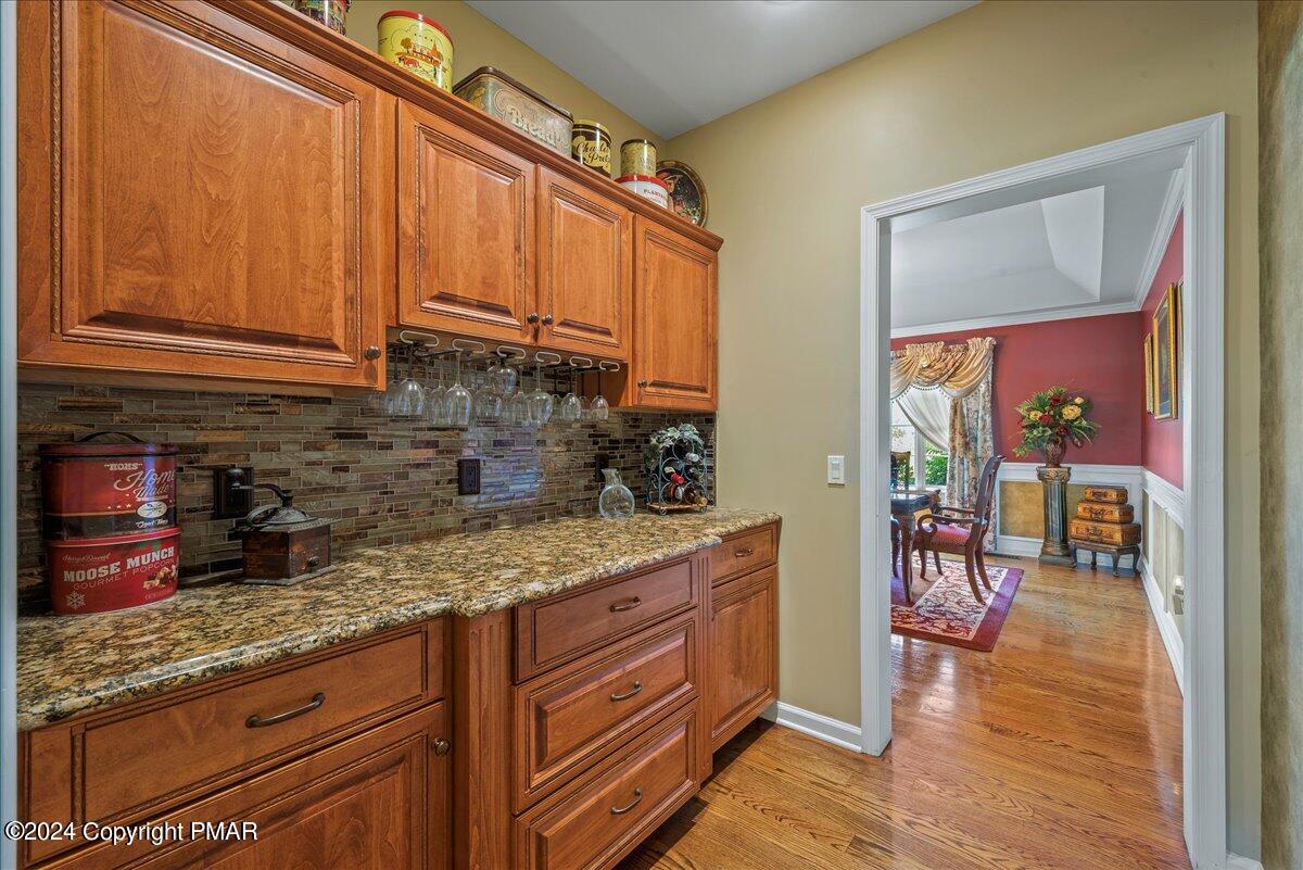3209 Crest Vue Circle Danielsville, PA 18038 - Photo 25 of 95 a kitchen with granite countertop stainless steel appliances a stove refrigerator sink and cabinets