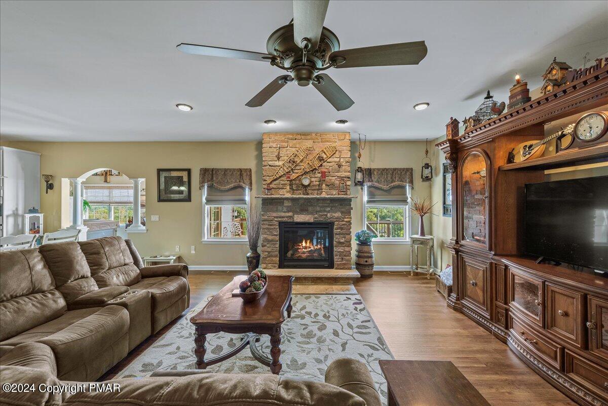 3209 Crest Vue Circle Danielsville, PA 18038 - Photo 39 of 95 a living room with furniture a flat screen tv and a fireplace