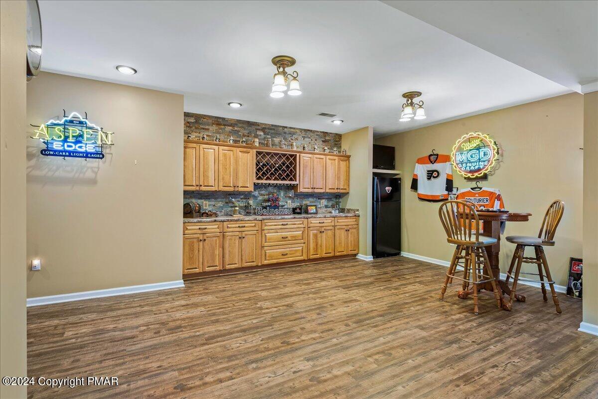 3209 Crest Vue Circle Danielsville, PA 18038 - Photo 76 of 95 a view of kitchen with cabinets and wooden floor