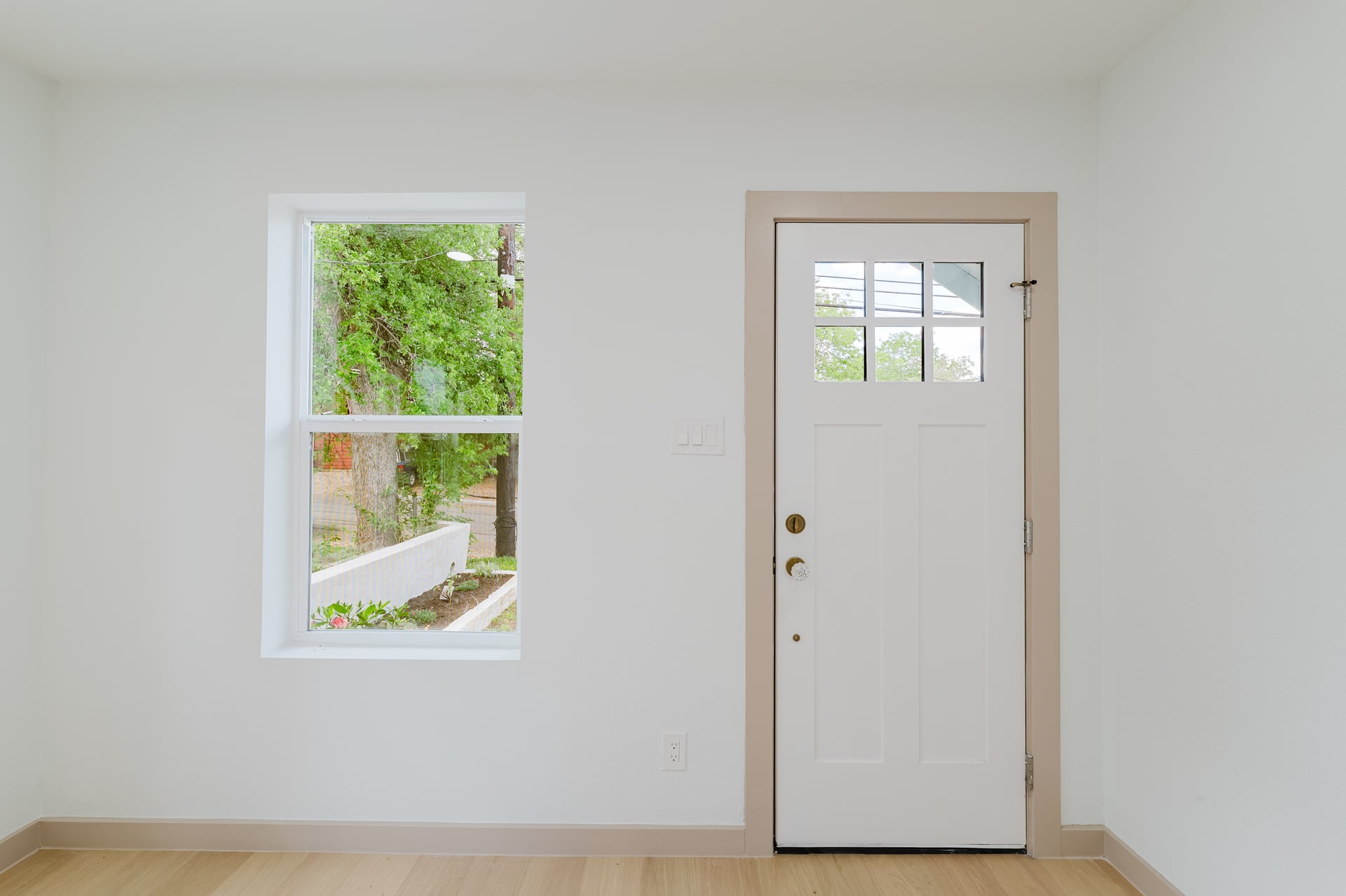 1905 East 21st Street Austin, TX 78722 - Photo 5 of 27 a view of an entryway with wooden floor