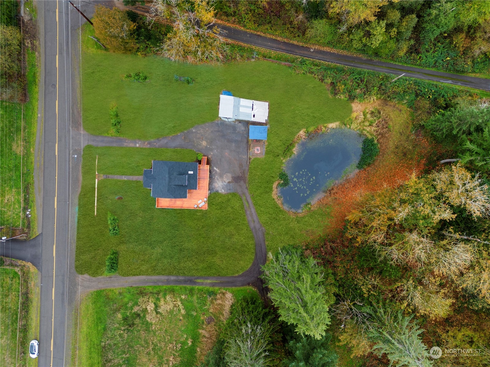 18847 Southeast Lake Youngs Road Renton, WA 98058 - Photo 38 of 38 an aerial view of a house with a yard basket ball court and outdoor seating