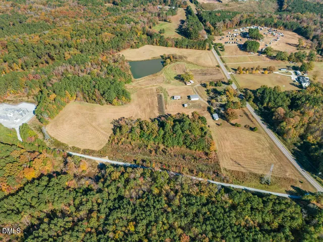 an aerial view of residential house with outdoor space