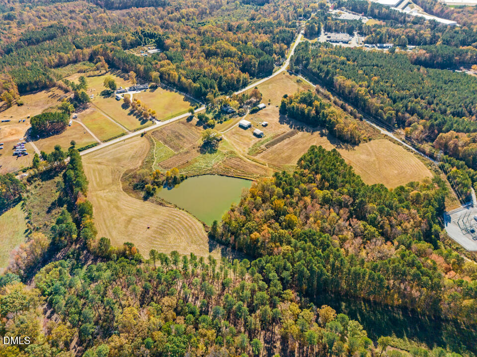 2207 Hamlin Road Durham, NC 27704 - Photo 13 of 21 an aerial view of residential houses with outdoor space