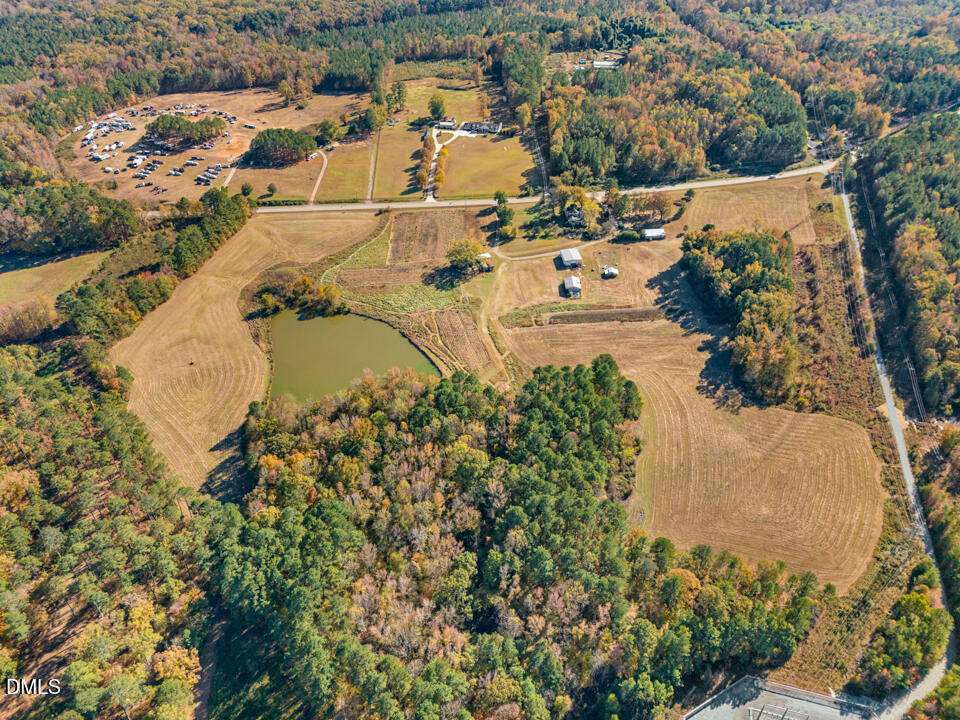2207 Hamlin Road Durham, NC 27704 - Photo 16 of 21 an aerial view of residential houses with outdoor space