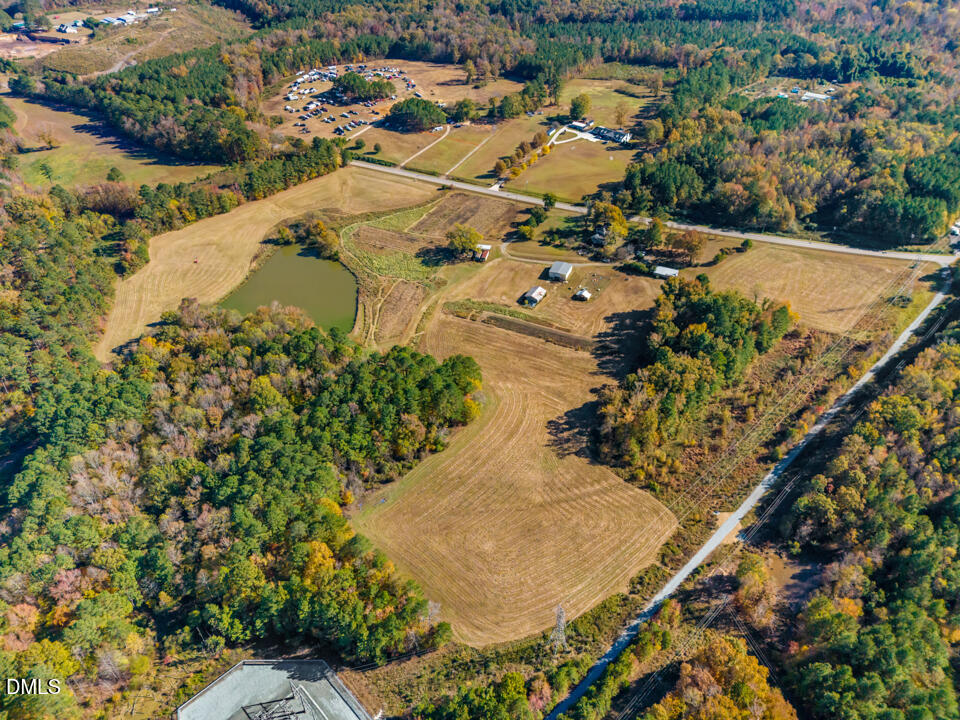 2207 Hamlin Road Durham, NC 27704 - Photo 16 of 20 an aerial view of residential houses with outdoor space