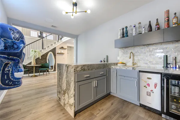 a living room with furniture fireplace and a flat screen tv