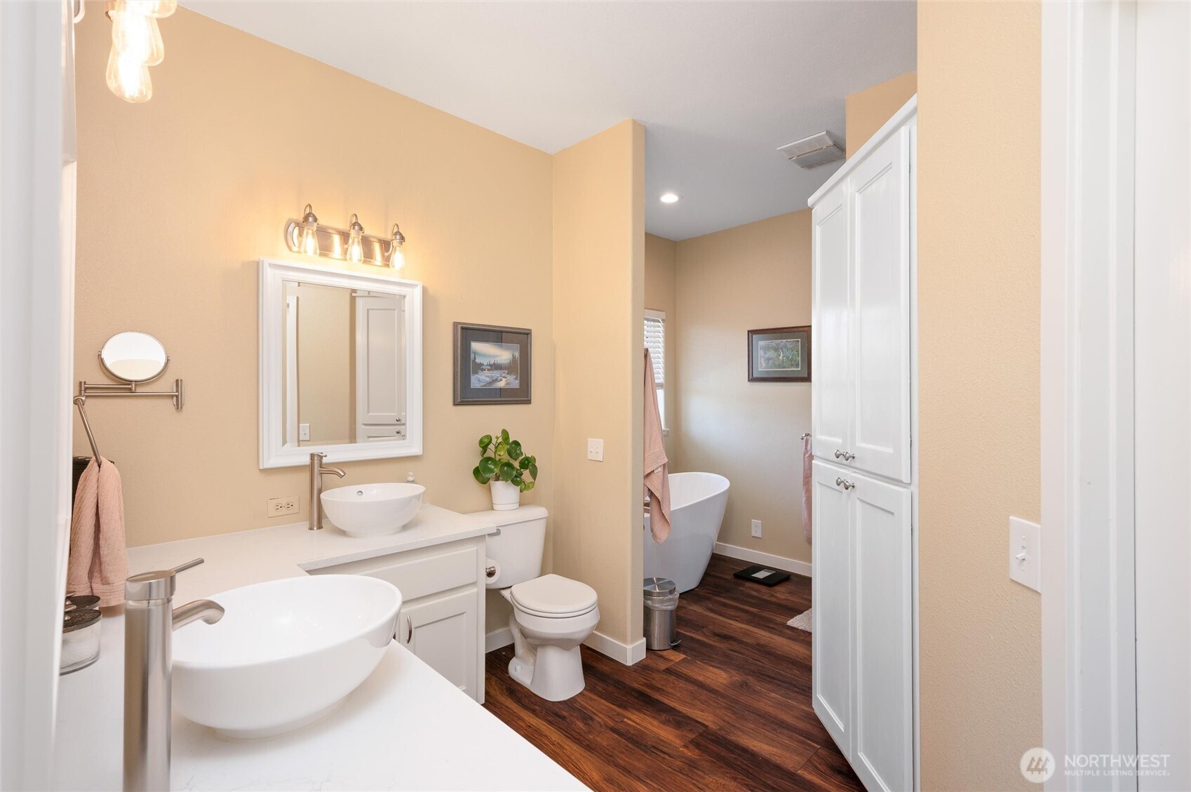 3167 Unick Road Ferndale, WA 98248 - Photo 14 of 40 a bathroom with a granite countertop toilet sink and a mirror