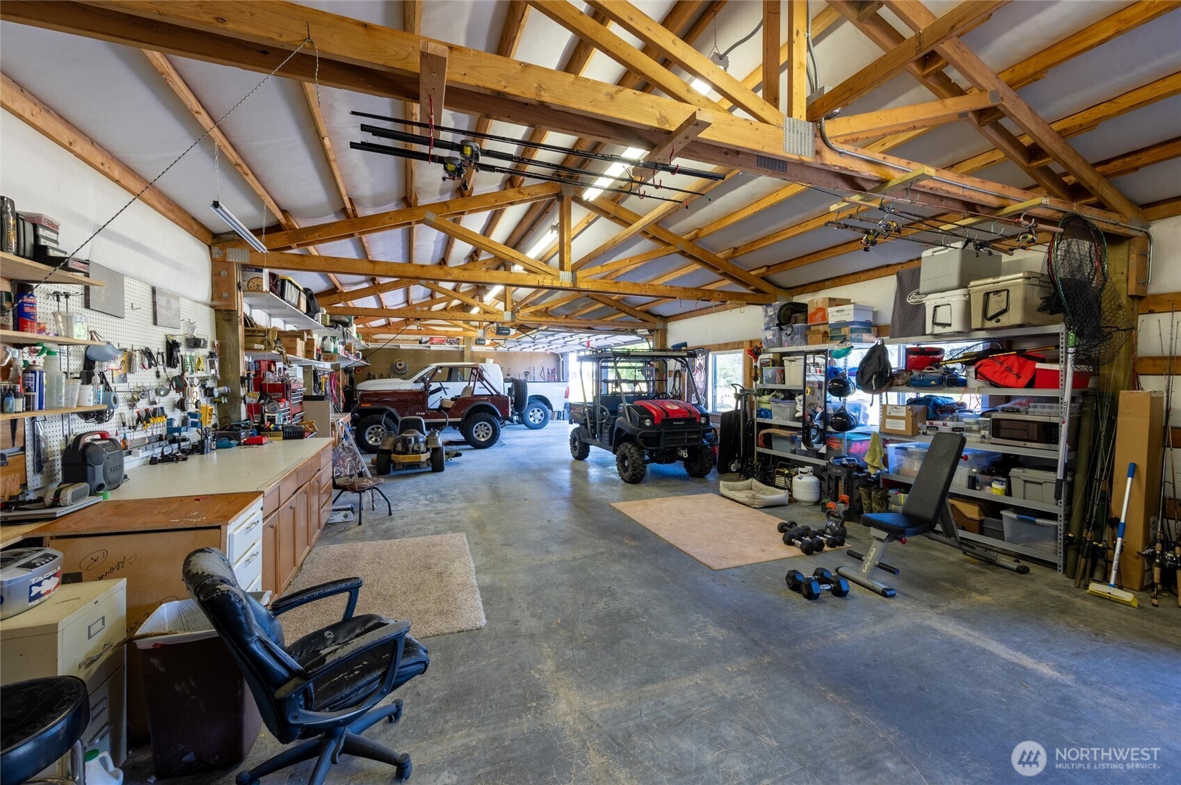 3167 Unick Road Ferndale, WA 98248 - Photo 31 of 40 a view of a garage with a bike and car
