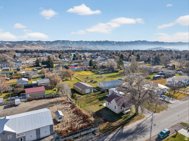 49 South 4th W Street Preston, ID 83263 - Photo 36 of 48 Aerial view of residential area featuring a mountainous background