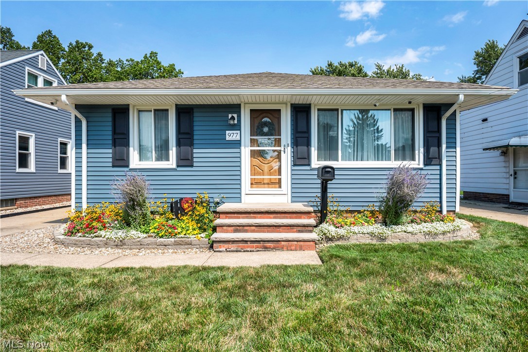 977 Lloyd Road Wickliffe, OH 44092 - Photo 1 of 38 Blue horizontal siding exterior with white trim