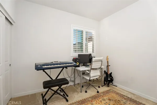 a work room with table and chairs