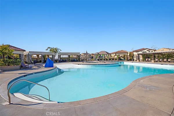 a view of a swimming pool and outdoor space