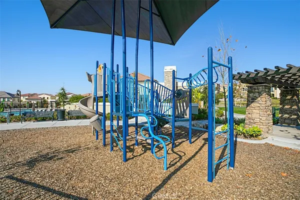 a view of a swimming pool and mountain view