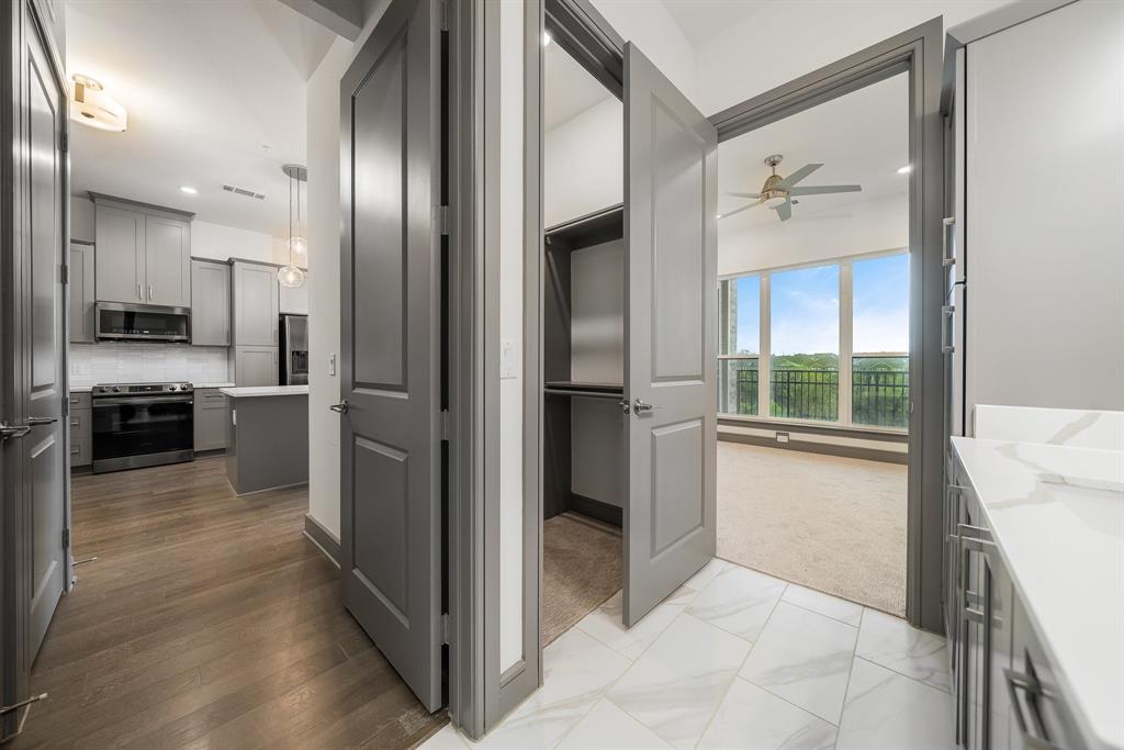 2700 Old Denton Road, Unit 3336 Carrollton, TX 75007 - Photo 13 of 28 a view of a kitchen with a refrigerator and a sink