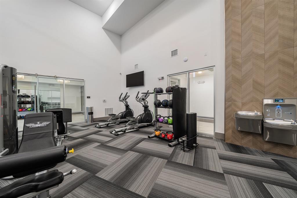 2700 Old Denton Road, Unit 3336 Carrollton, TX 75007 - Photo 24 of 28 a view of a room with gym equipment