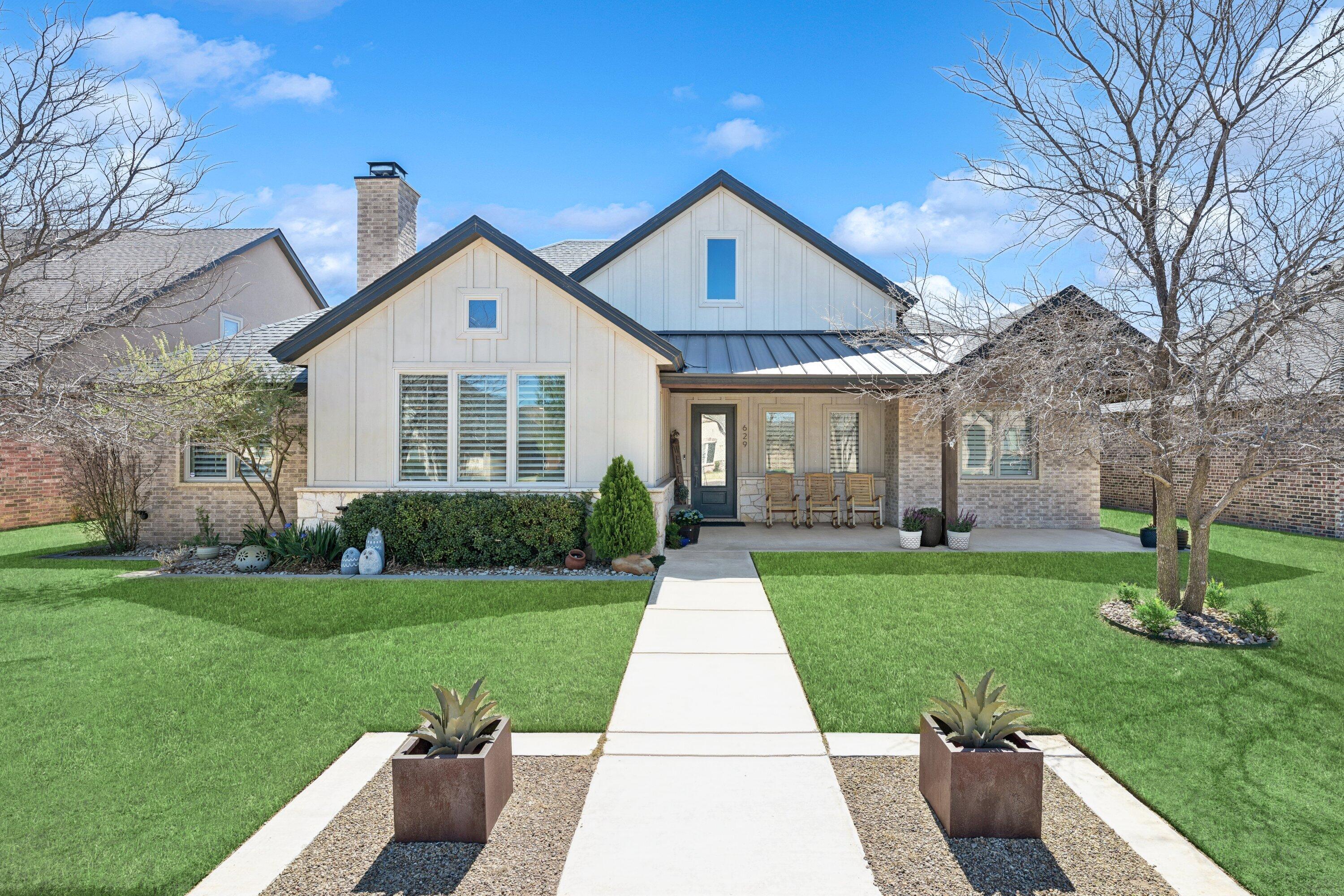 629 North 9th Street Wolfforth, TX 79382 - Photo 1 of 45 a front view of a house with a yard