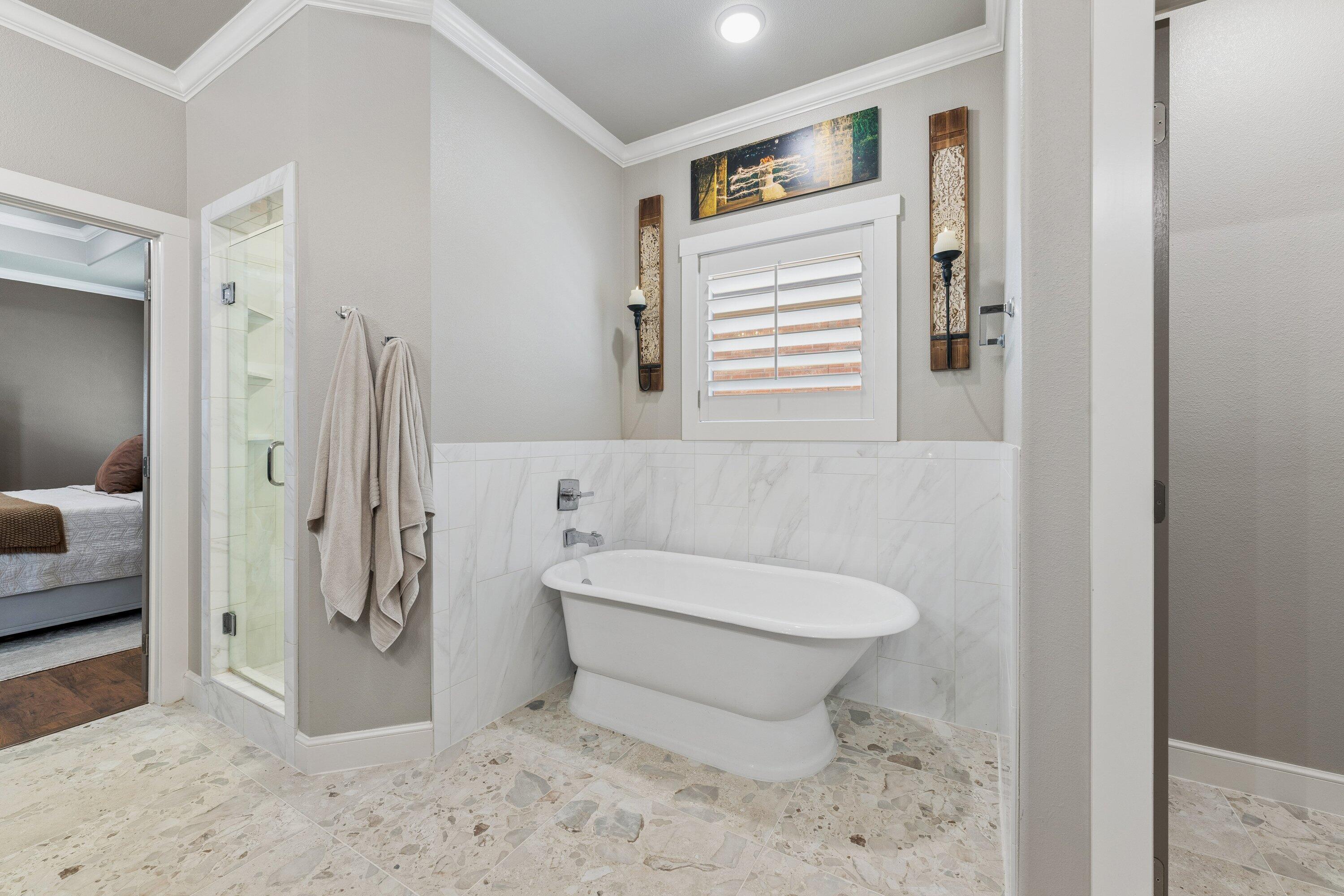 629 North 9th Street Wolfforth, TX 79382 - Photo 26 of 45 a bathroom with a toilet sink and shower
