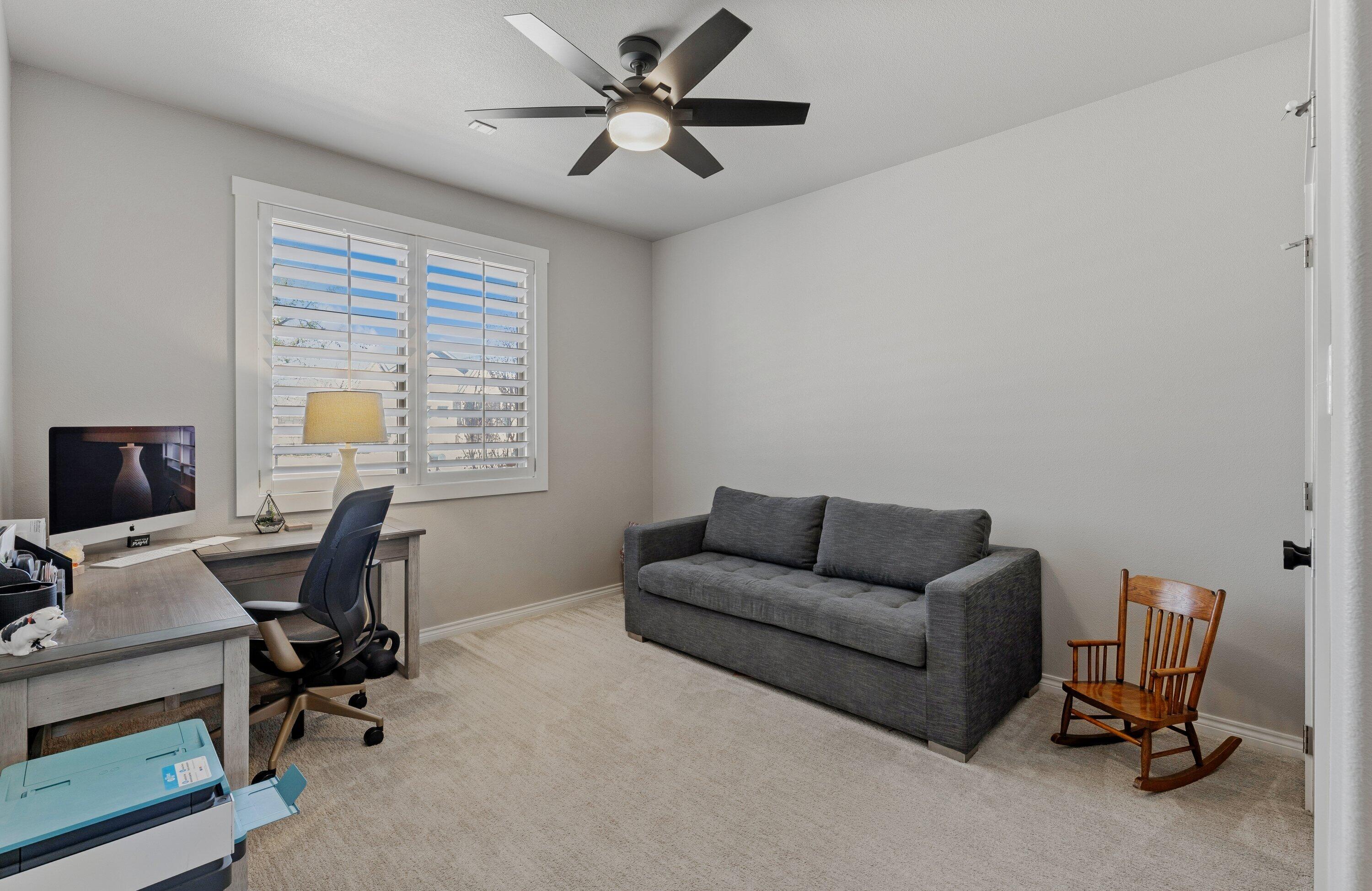 629 North 9th Street Wolfforth, TX 79382 - Photo 31 of 45 a work room with furniture and a window