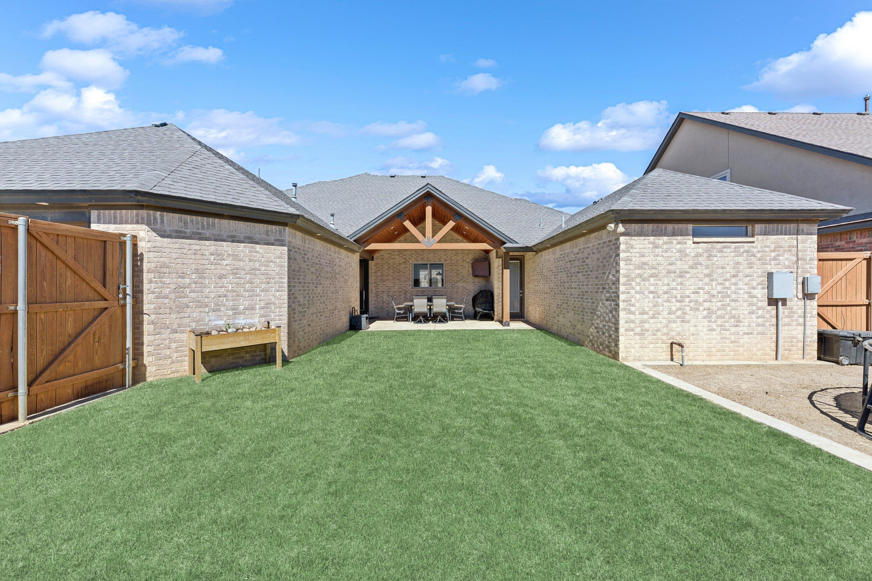 629 North 9th Street Wolfforth, TX 79382 - Photo 37 of 45 a front view of a house with garden