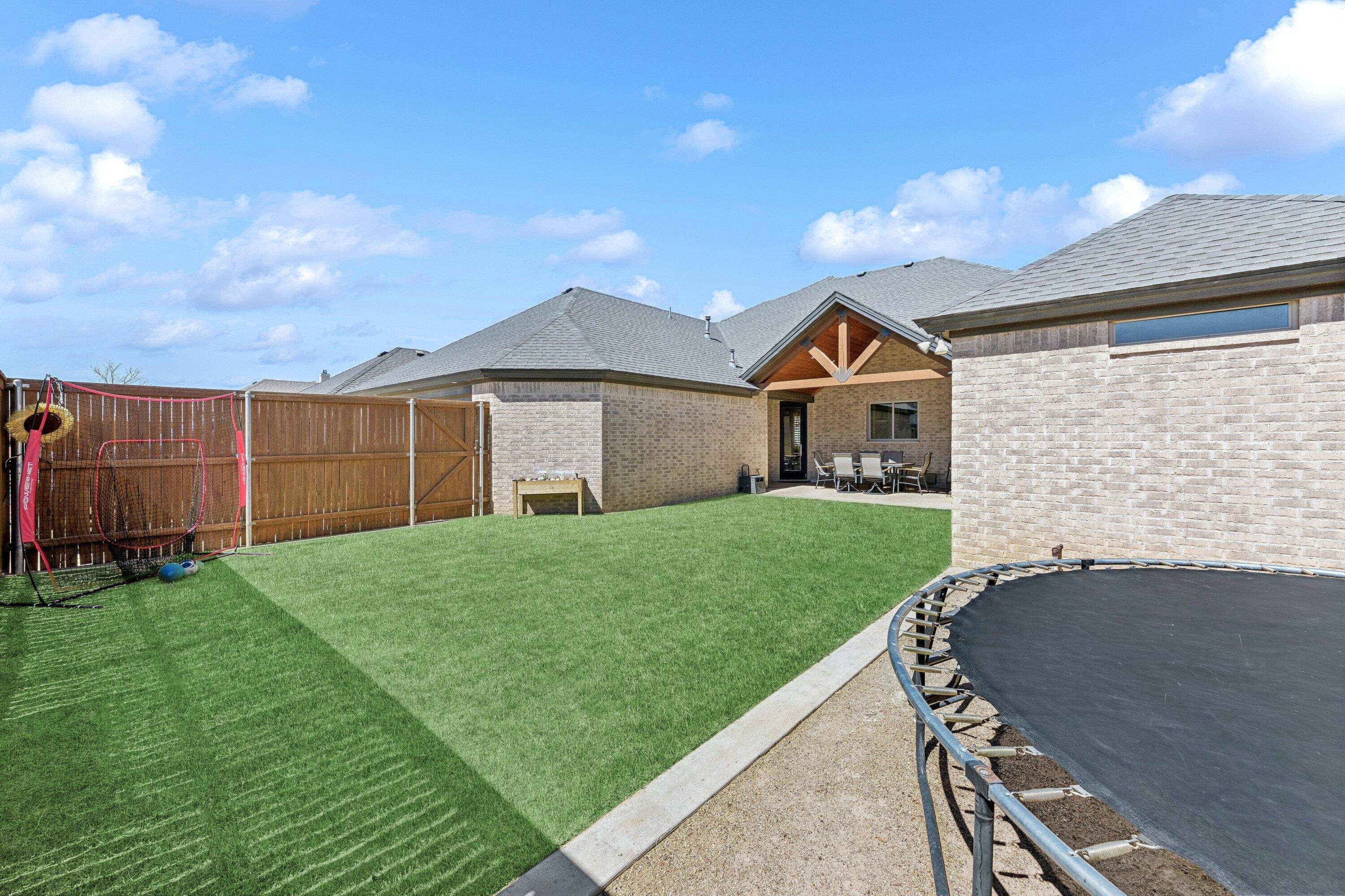 629 North 9th Street Wolfforth, TX 79382 - Photo 38 of 45 a front view of a house with a yard