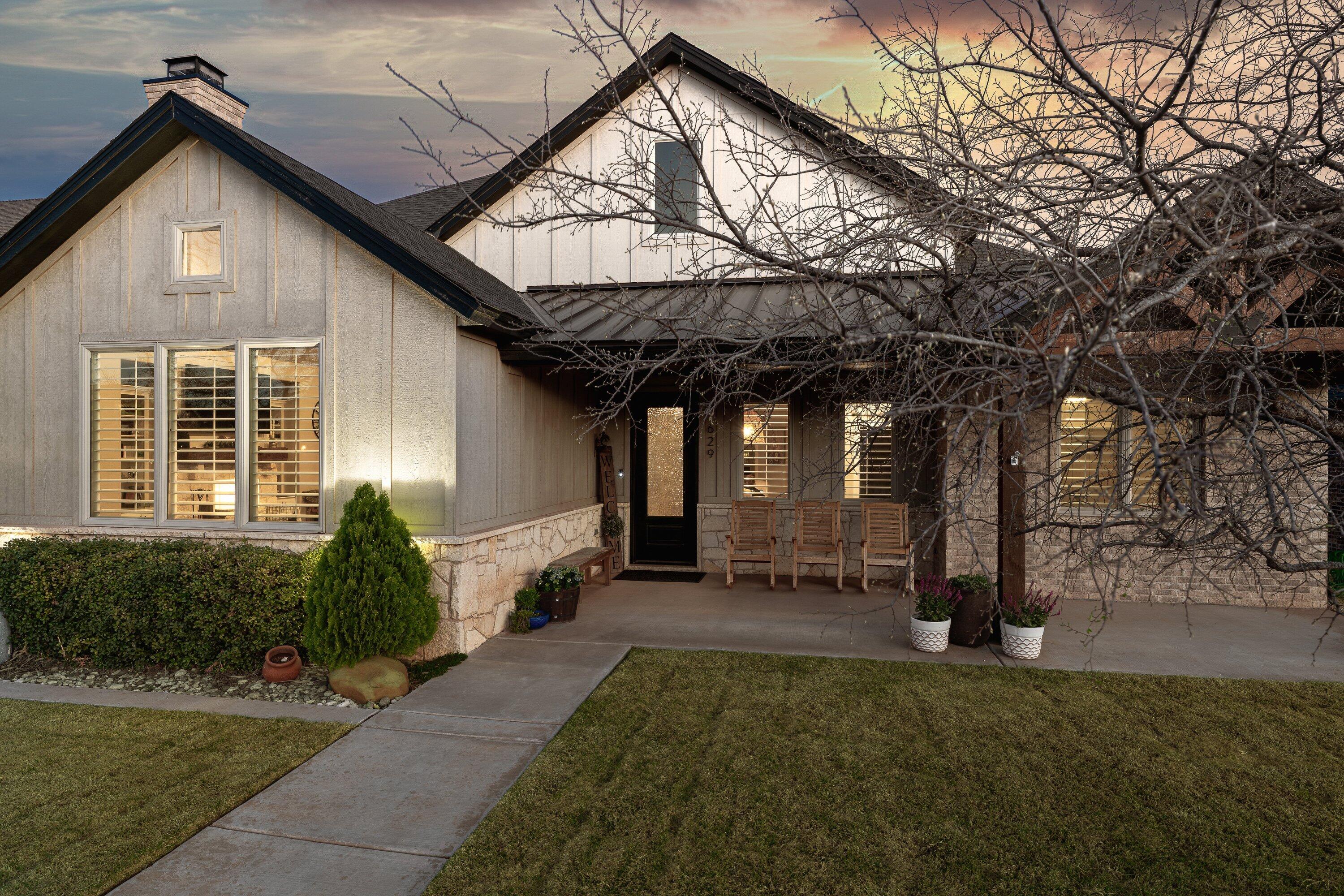 629 North 9th Street Wolfforth, TX 79382 - Photo 41 of 45 a front view of a house with garden