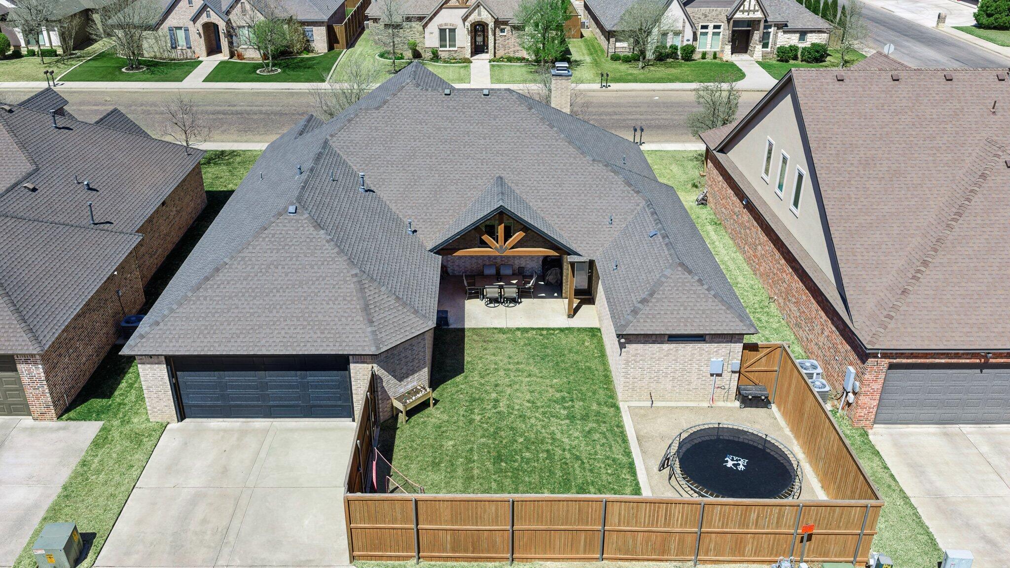 629 North 9th Street Wolfforth, TX 79382 - Photo 43 of 45 an aerial view of a house with a yard