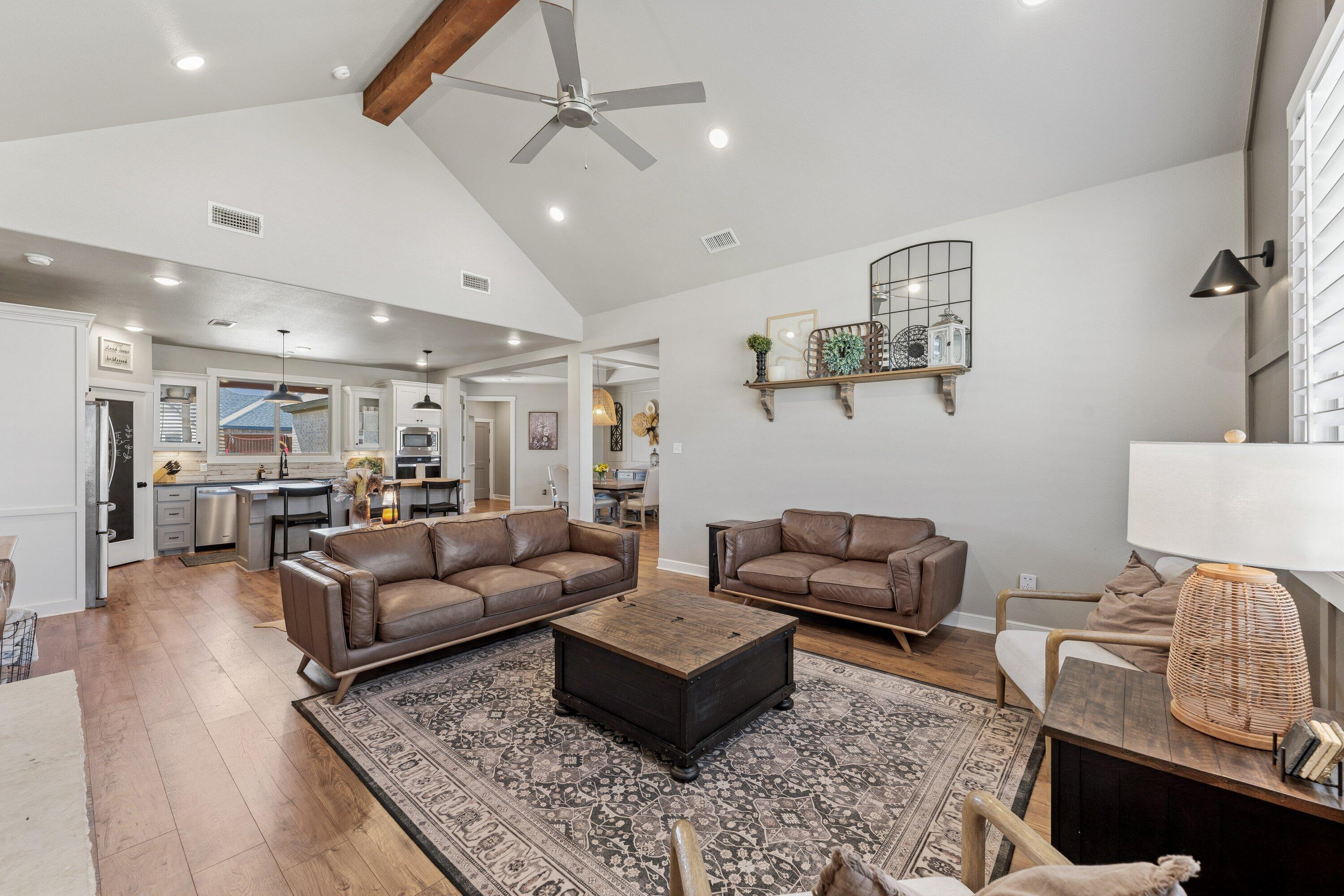 629 North 9th Street Wolfforth, TX 79382 - Photo 7 of 45 a living room with furniture and wooden floor