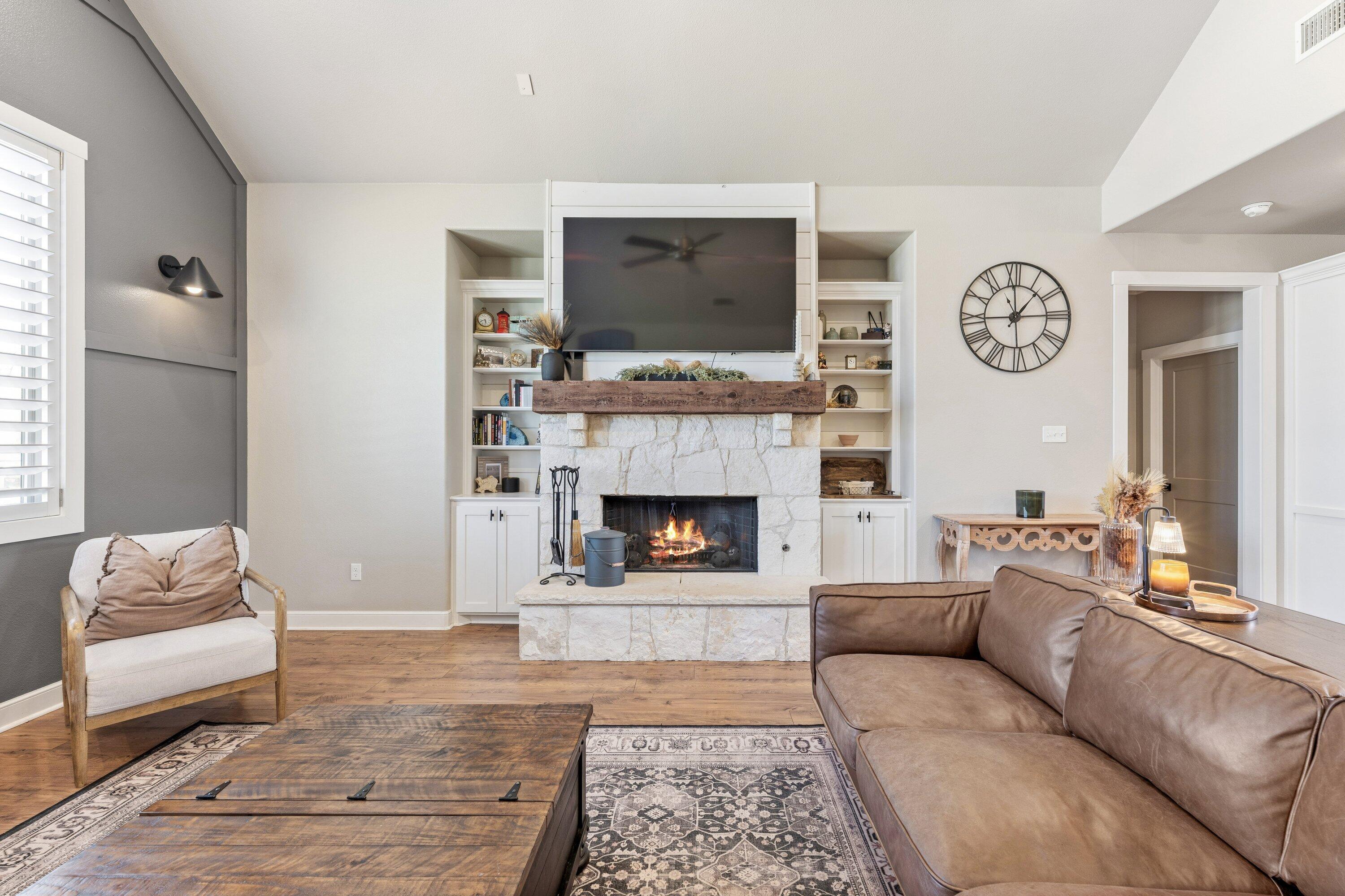 629 North 9th Street Wolfforth, TX 79382 - Photo 9 of 45 a living room with furniture and a fireplace