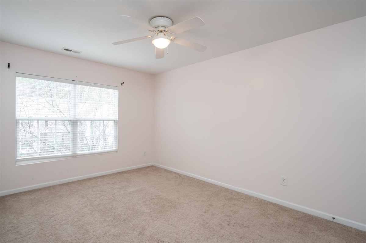 8311 Clasara Circle Raleigh, NC 27613 - Photo 20 of 27 All three bedrooms upstairs (master bedroom in back, and secondary bedrooms up front with hall bath) Bedroom