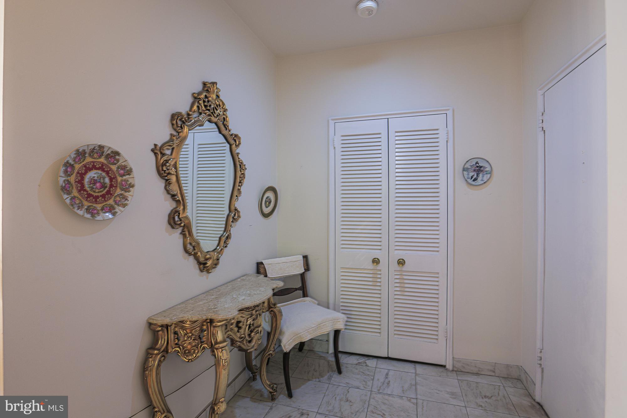 11 Slade, Unit 614 Pikesville, MD 21208 - Photo 9 of 38 a view of a hallway with elevator
