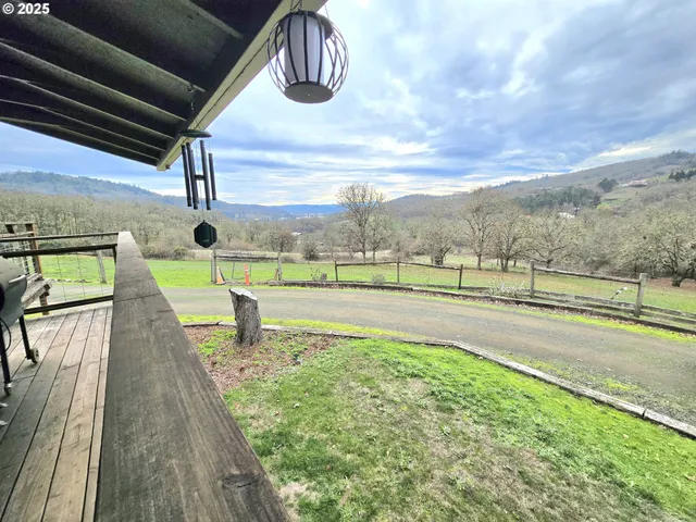 a view of a swimming pool with an outdoor seating