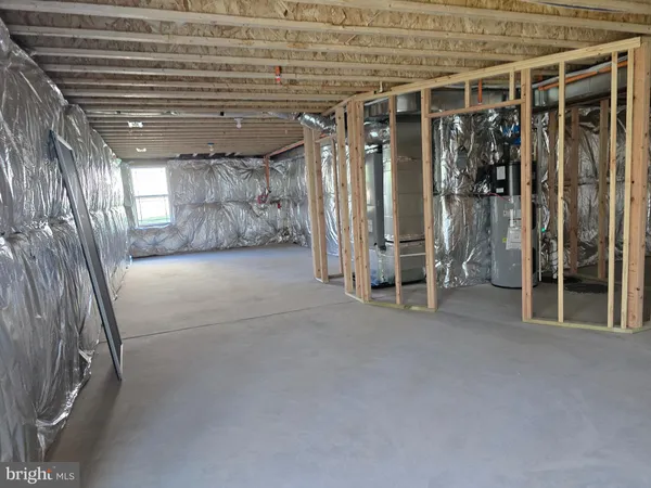 a kitchen with kitchen island a sink stainless steel appliances and cabinets