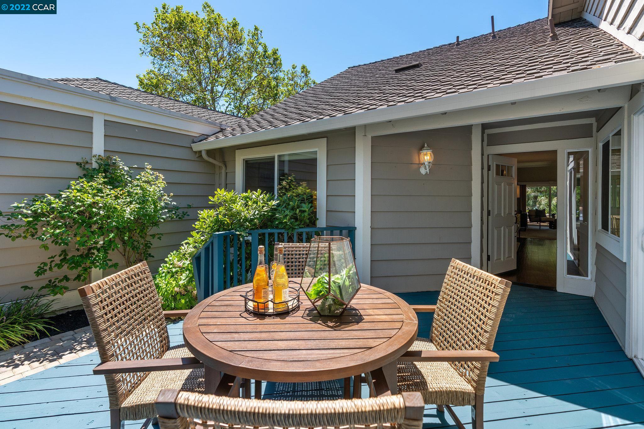 535 Silver Lake Drive Danville, CA 94526 - Photo 1 of 1 a view of a chair and table in backyard
