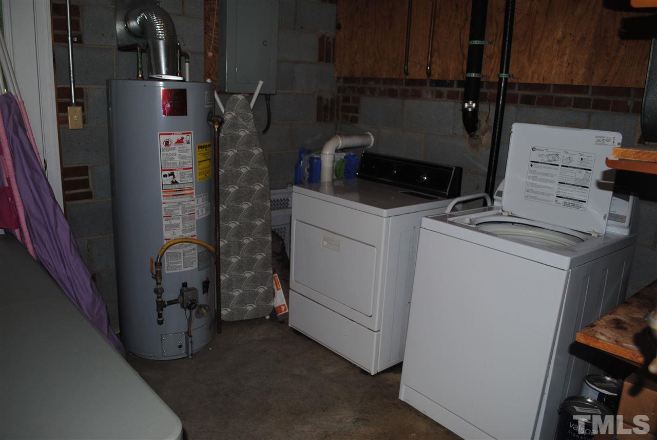 5508 Knollwood Road Raleigh, NC 27609 - Photo 12 of 19 a view of storage and utility room with washer and dryer