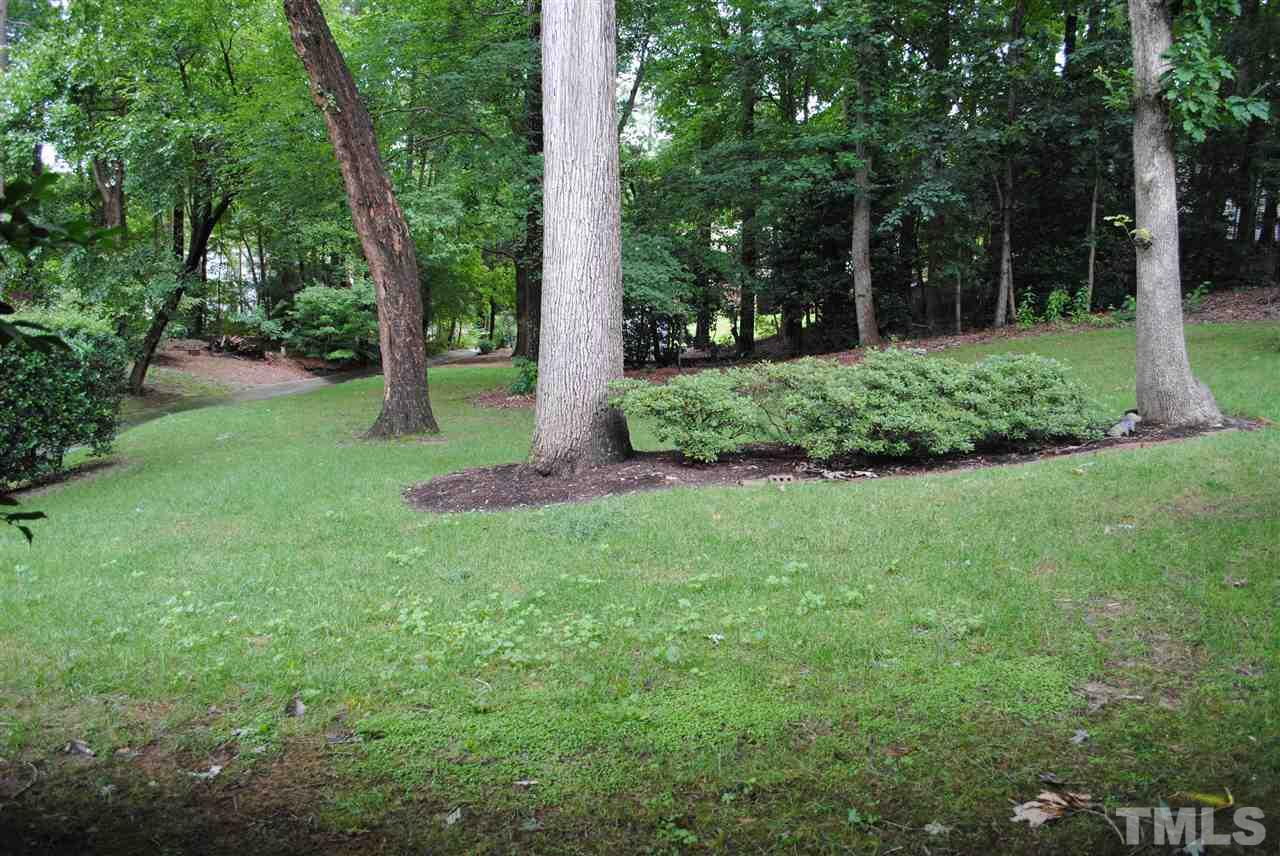 5508 Knollwood Road Raleigh, NC 27609 - Photo 18 of 19 a view of a garden with trees