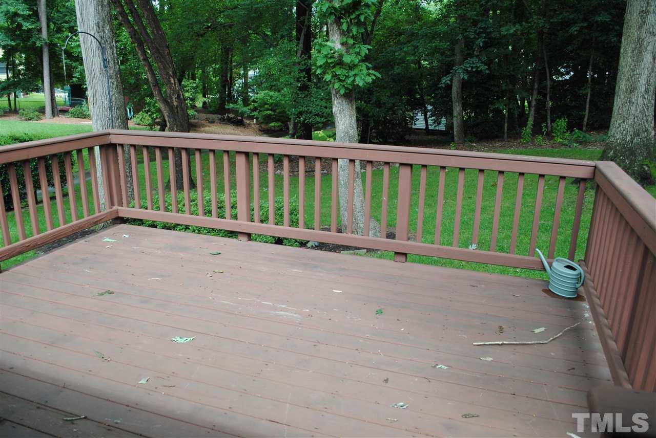 5508 Knollwood Road Raleigh, NC 27609 - Photo 19 of 19 a view of backyard with green space and wooden fence