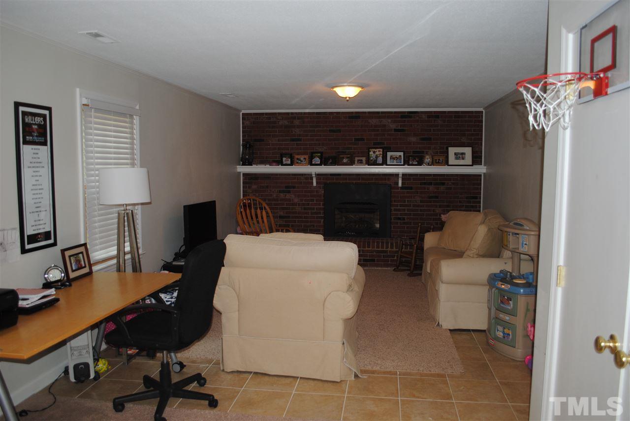 5508 Knollwood Road Raleigh, NC 27609 - Photo 9 of 19 a work place with a desk and chair