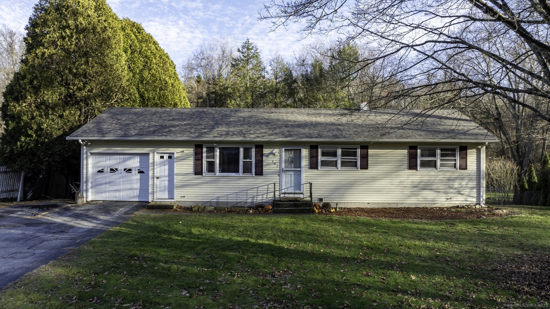 142 Starr Street Norwich, CT 06360 - Photo 1 of 32 a front view of a house with a garden