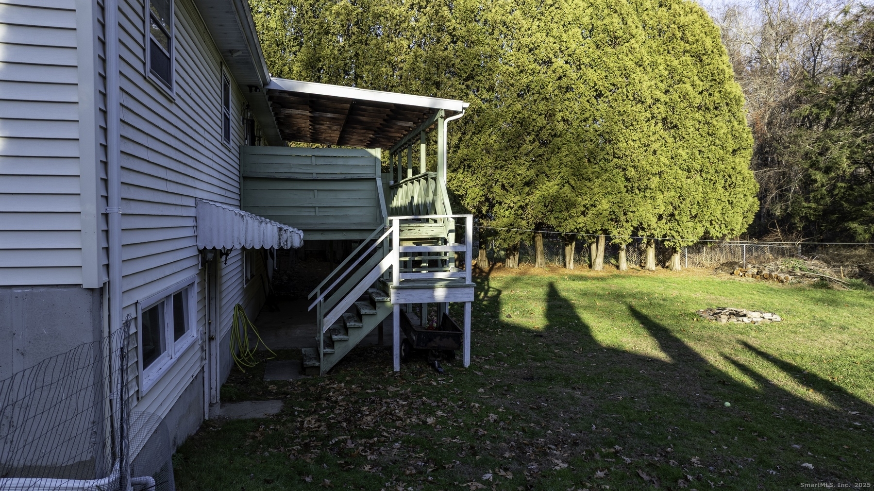 142 Starr Street Norwich, CT 06360 - Photo 11 of 32 a view of a house with a yard