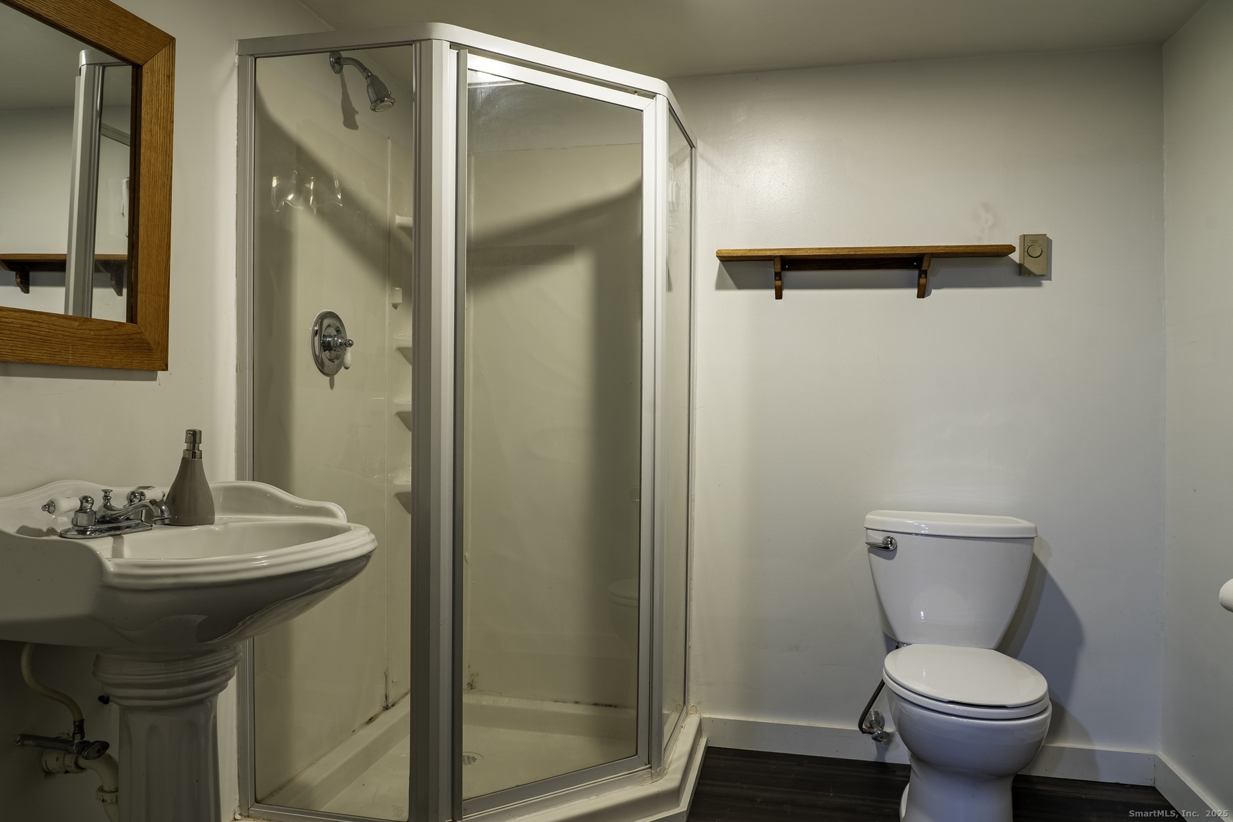 142 Starr Street Norwich, CT 06360 - Photo 30 of 32 a bathroom with a sink toilet and shower