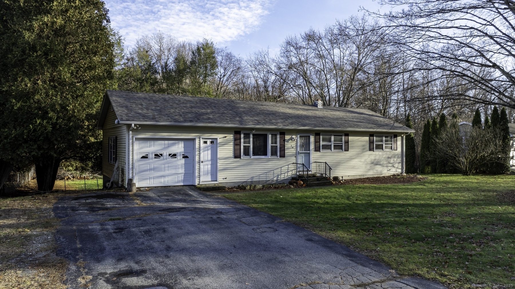 142 Starr Street Norwich, CT 06360 - Photo 3 of 32 a front view of a house with a yard