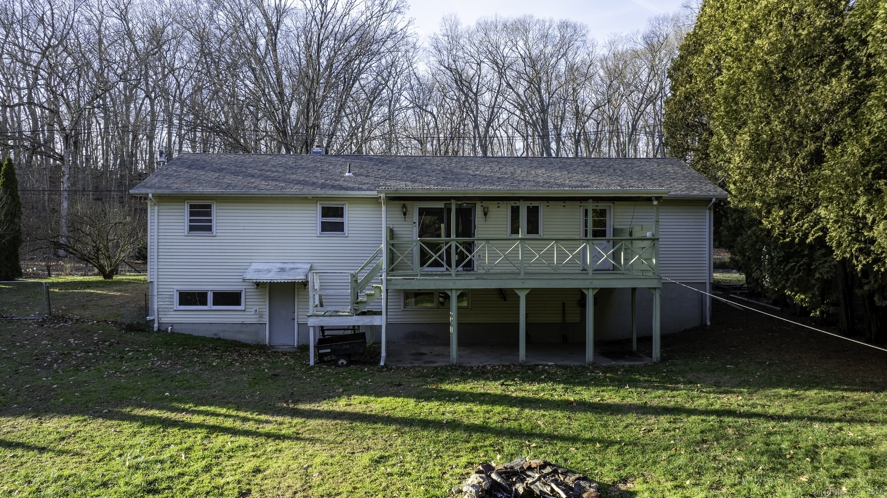 142 Starr Street Norwich, CT 06360 - Photo 9 of 32 a view of a house with a yard