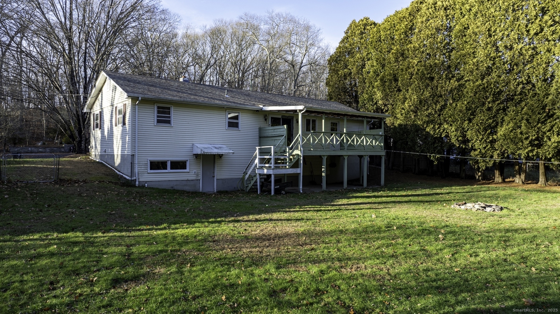 142 Starr Street Norwich, CT 06360 - Photo 10 of 32 a view of a house with a yard