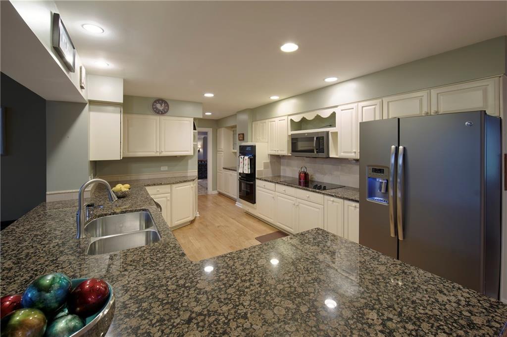 1910 Murdstone Road Pittsburgh, PA 15241 - Photo 10 of 24 Kitchen with handsome white cabinetry...